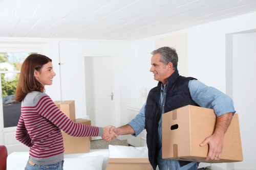 Professional removals service preparing items for transport in Downham