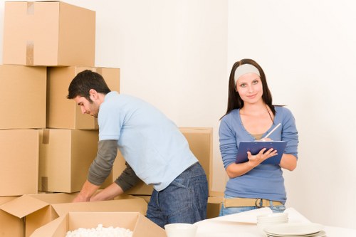 Furniture and boxes being loaded for a Downham moving job