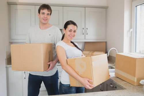 Packed boxes and furniture prepared for storage in Downham